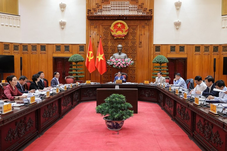 Thủ tướng Chính phủ Phạm Minh Chính chủ trì cuộc họp của Thường trực Chính phủ xem xét Đồ án quy hoạch trục đại lộ cảnh quan sông Hồng và Khu đô thị thể thao Olympic, Thủ đô Hà Nội - Ảnh: VGP/Nhật Bắc