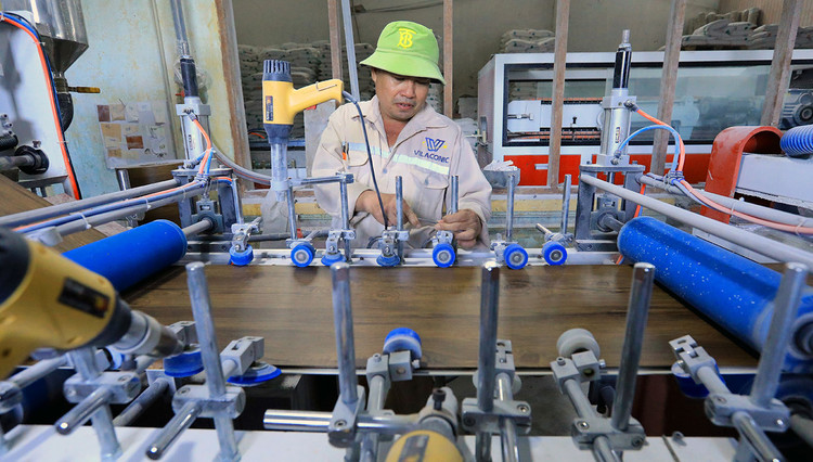 Phân ngành công nghiệp hỗ trợ cho các ngành ô tô, dệt may, da - giày, cơ khí, điện tử… được đề xuất trong nhóm ngành công nghiệp trọng điểm. Ảnh: Tuấn Anh