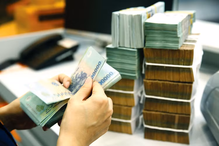 Giai đoạn từ 2016 đến thời điểm 31/7/2020, toàn hệ thống tổ chức tín dụng đã xử lý được 620,7 nghìn tỷ đồng nợ xấu. Ảnh: Lê Tiên