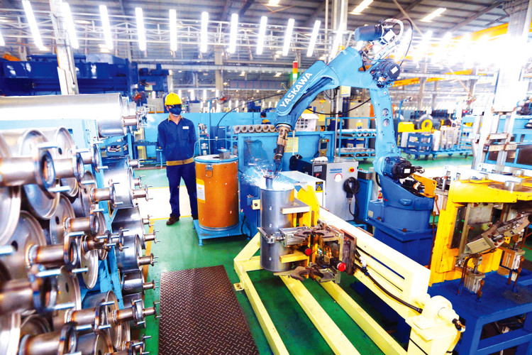 Một môi trường pháp lý ổn định sẽ tạo điều kiện thuận lợi cho doanh nghiệp mở rộng đầu tư, mạnh dạn đổi mới sáng tạo để phát triển. Ảnh: Lê Tiên