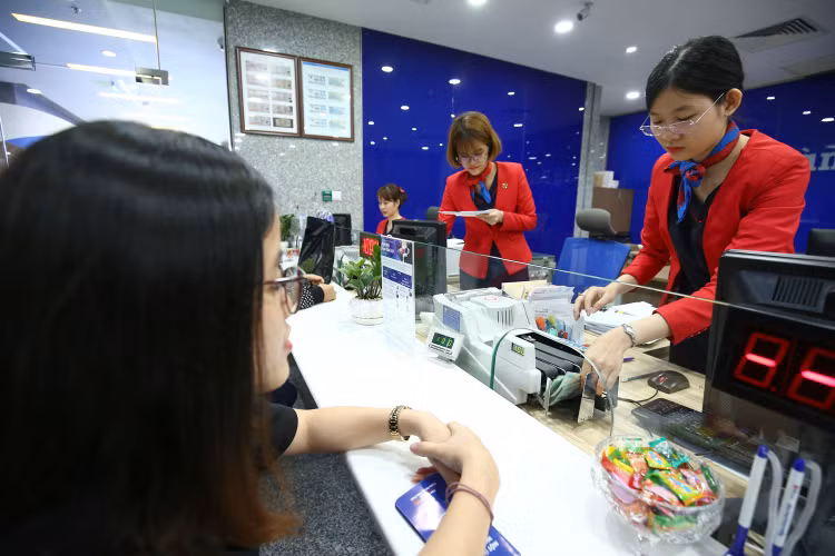 Dự thảo Luật Các tổ chức tín dụng mở rộng phạm vi điều chỉnh sẽ góp phần thúc đẩy xử lý nợ xấu. Ảnh: Tiên Giang