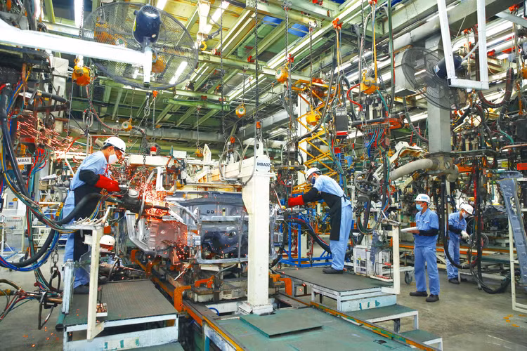 Môi trường kinh doanh ngày càng thông thoáng, thuận lợi khiến Việt Nam trở thành địa chỉ đầu tư tin cậy, hấp dẫn đối với nhà đầu tư nước ngoài. Ảnh: Lê Tiên