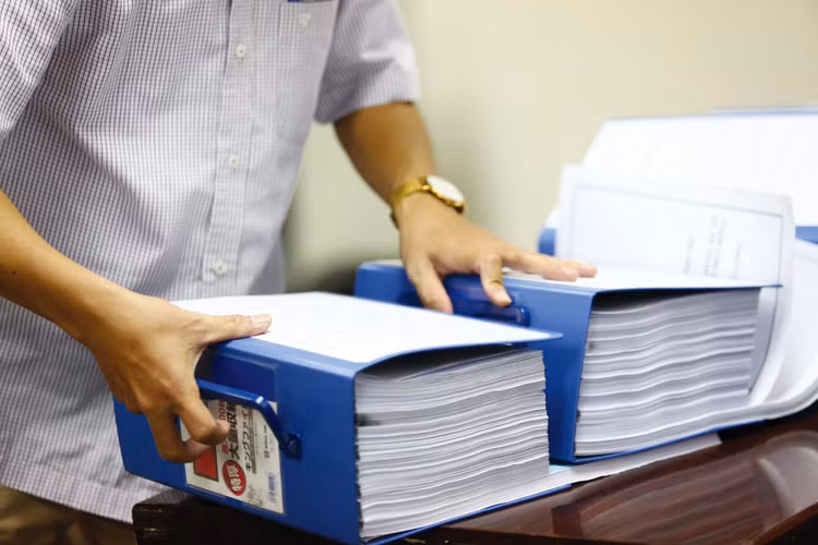 Trong quá trình điều tra hành vi làm giả tài liệu hồ sơ đấu thầu, các đối tượng có khai làm giả một số giấy tờ trong HSDT của Công ty CP Xây dựng và Thương mại Yến Vân. Ảnh minh họa: Tiến Tân