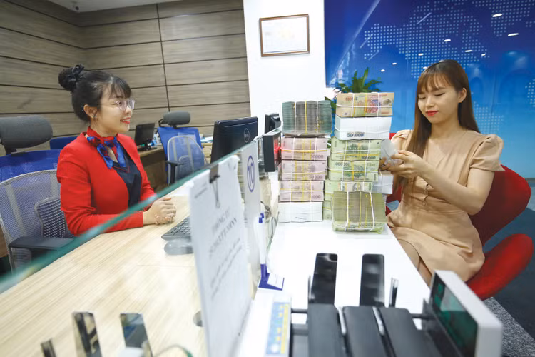 Ngân hàng Nhà nước đặt mục tiêu tăng trưởng tín dụng năm 2025 là 16%, tương đương với 2,5 triệu tỷ đồng sẽ được bơm ra thị trường. Ảnh: Minh Dũng