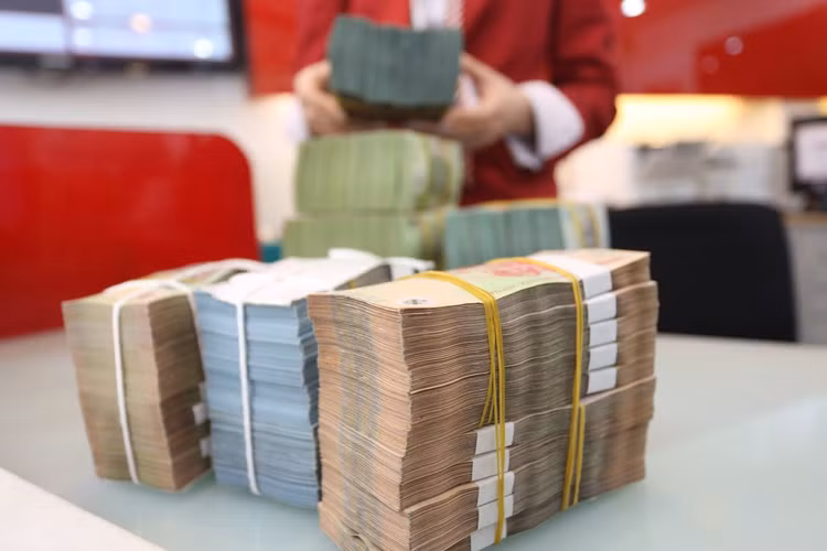 Đến nay, nợ xấu nội bảng của hệ thống tổ chức tín dụng là 5%. Ảnh: Nhã Chi