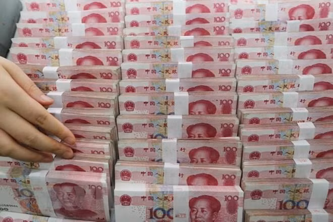 Giá đồng nhân dân tệ tăng mạnh. (Nguồn: AFP/TTXVN)