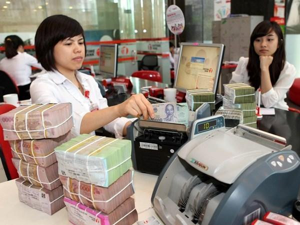 Tỷ giá trung tâm giảm 9 đồng. Ảnh minh họa: TTXVN