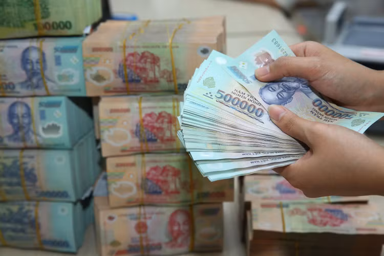 Trong tháng 5, số tiền trả nợ của Chính phủ là khoảng 30.516 tỷ đồng, trong đó trả nợ trong nước khoảng 26.967 tỷ đồng, trả nợ nước ngoài khoảng 3.549 tỷ đồng . Ảnh: Lê Tiên