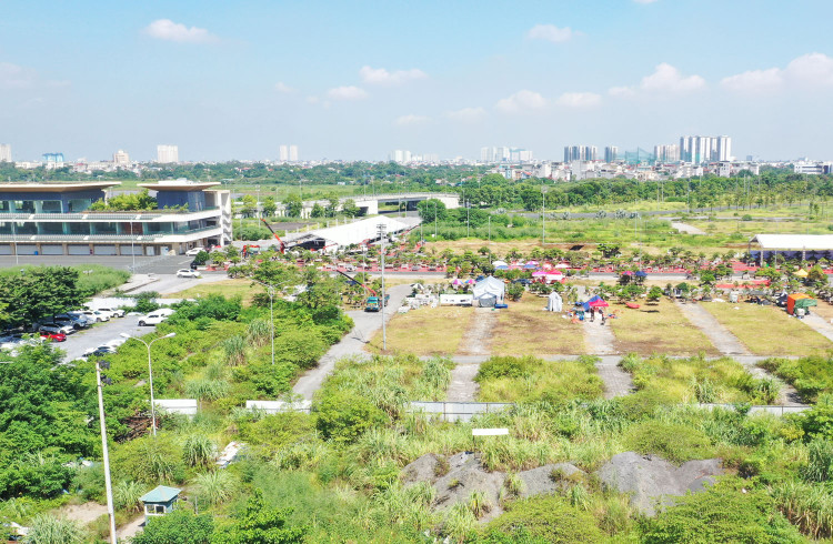 Hệ thống pháp luật liên quan đến đất đai còn thiếu đồng bộ, gây khó khăn trong tổ chức thực thi, nhất là giai đoạn chuyển tiếp. Ảnh: Tiên Giang