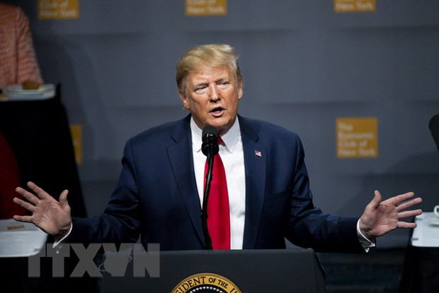 Tổng thống Trump khẳng định ông đã trả hàng triệu USD tiền thuế. (Ảnh: AFP/TTXVN)