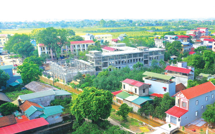 Nhiệm vụ quản lý nhà nước về xây dựng của UBND huyện, quận, thị xã, thành phố thuộc tỉnh do UBND cấp xã thực hiện. Ảnh: Tiên Giang