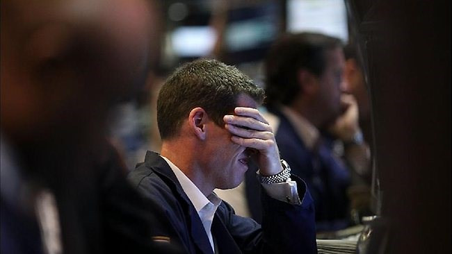  Chưa kịp nở nụ cười trong phiên hồi phục thứ Ba, giới đầu tư phố Wall đã nhanh chóng nhận cú sốc trong phiên thứ Tư (Ảnh minh họa: AFP)