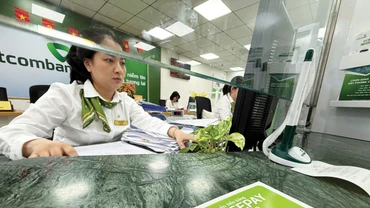 Đến cuối tháng 11/2025, tổng tài sản của hệ thống các tổ chức tín dụng đạt 27.058,28 nghìn tỷ đồng, tăng 18% so với cuối năm 2024. Ảnh: Nhã Chi