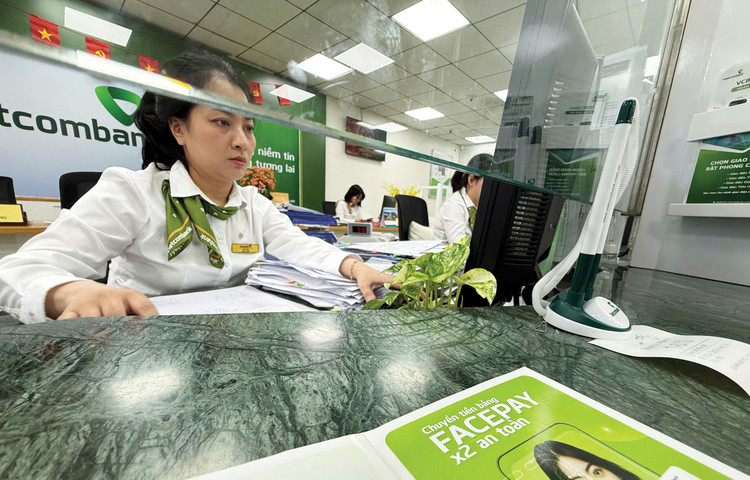 Đến cuối tháng 11/2025, tổng tài sản của hệ thống các tổ chức tín dụng đạt 27.058,28 nghìn tỷ đồng, tăng 18% so với cuối năm 2024. Ảnh: Nhã Chi