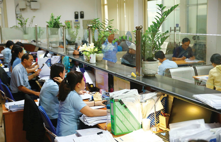 Bộ Tài chính đề xuất phân cấp cho các bộ, ngành, địa phương rà soát, phê duyệt, điều chỉnh Danh mục chuyển đổi sự nghiệp công lập thành công ty cổ phần. Ảnh: Nhã Chi