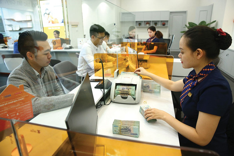 Ngân hàng Nhà nước đề xuất cho phép các ngân hàng cấp tín dụng vượt trần đối với những dự án lớn, quan trọng trên địa bàn Hà Nội. Ảnh: Nhã Chi