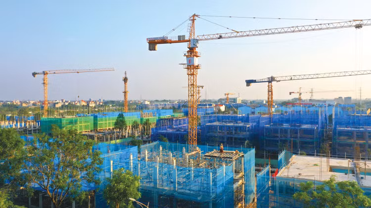 Luật Xây dựng sửa đổi phân định rõ trách nhiệm của các chủ thể tham gia hoạt động xây dựng và hoàn thiện cơ chế quản lý chi phí, hợp đồng xây dựng. Ảnh: Lê Tiên