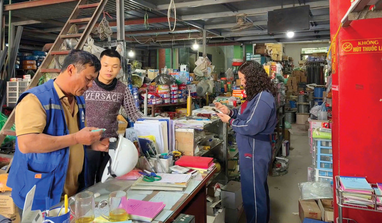 Cơ quan thuế sẽ triển khai đợt cao điểm 15 ngày hỗ trợ hộ kinh doanh đăng ký, kê khai và nộp thuế theo quy định mới. Ảnh: Tiên Giang