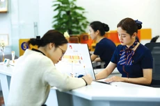 Việc dừng chính sách giữ nguyên nhóm nợ sẽ khiến một số doanh nghiệp khó tiếp cận nguồn tín dụng để khôi phục sản xuất, kinh doanh. Ảnh: Lê Tiên