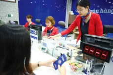 Năm 2022, nhiều khả năng lãi suất có thể tăng nhưng mức biến động sẽ không lớn. Ảnh: Lê Tiên