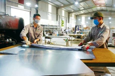 Đối với doanh nghiệp sản xuất, sự phục hồi, phát triển ở mức độ nào phụ thuộc rất nhiều vào giá cả nguyên vật liệu đầu vào. Ảnh: Nhã Chi