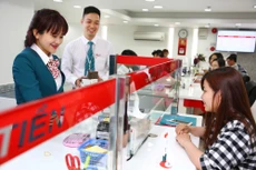 Nhiều chuyên gia nhận định, việc tăng lãi suất ở thời điểm này là không cần thiết, có thể khiến đà phục hồi kinh tế gặp trở ngại. Ảnh: Lê Tiên