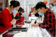 Giá vàng trong nước sáng 30/3 biến động trái chiều. Ảnh: Trần Việt - TTXVN