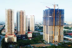 Thị trường bất động sản bị ảnh hưởng mạnh bởi động thái kiểm soát tín dụng của Ngân hàng Nhà nước. Ảnh: Tiên Giang