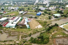 Dự thảo Luật Đất đai (sửa đổi) đưa ra tiêu chí, khu đất được lựa chọn để đấu thầu dự án sử dụng đất phải bảo đảm điều kiện đã có quy hoạch chi tiết 1/500. Ảnh: Tiên Giang