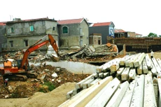 Hồ sơ mời thầu yêu cầu nhà thầu phải có bãi đổ thải, bãi tập kết vật tư thuộc địa bàn TP. Đồng Xoài. Ảnh minh họa: Tường Lâm