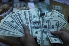 Giá usd tại vietcombank 11/1 giảm 30 đồng. Ảnh: TTXVN