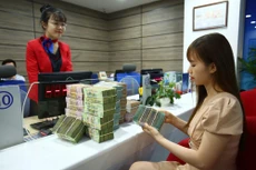 Thủ tướng yêu cầu Ngân hàng Nhà nước phối hợp nhanh với các cơ quan liên quan, khẩn trương hoàn thiện, trình Chính phủ ban hành Nghị định hướng dẫn thực hiện hỗ trợ lãi suất cho vay. Ảnh: Lê Tiên