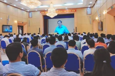 Điểm cầu tham dự Hội nghị trực tuyến của Bộ Kế hoạch và Đầu tư tại Trụ sở 6B Hoàng Diệu, Ba Đình, Hà Nội - Ảnh Bích Thảo