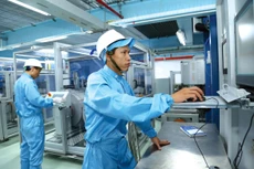 Thúc đẩy công nghiệp hóa, hiện đại hóa nhằm góp phần thực hiện mục tiêu đưa Việt Nam trở thành nước đang phát triển có công nghiệp hiện đại, thu nhập trung bình cao vào năm 2030. Ảnh: Nhã Chi