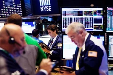 Các nhà giao dịch cổ phiếu trên sàn NYSE - Ảnh: Getty.