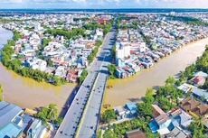 Dự án Đường giao thông hai bên bờ sông Bảo Định với tổng mức đầu tư gần 2.000 tỷ đồng sẽ tạo điều kiện phát triển kinh tế, du lịch cho TP. Mỹ Tho và huyện Chợ Gạo, tỉnh Tiền Giang. Ảnh: Lê Hải