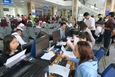 Thủ tục về thuế nên được sửa đổi, hoàn thiện theo hướng giảm thủ tục hành chính cho doanh nghiệp. Ảnh: Mạnh Hà
