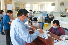 6 tháng đầu năm, cơ quan thuế đã ban hành 9.153 quyết định hoàn thuế giá trị gia tăng với tổng số tiền thuế hoàn là 64.209 tỷ đồng. Ảnh: Song Lê