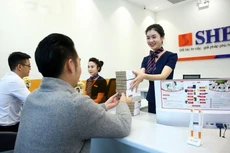 Trong 5 tháng đầu năm 2022, hoạt động sản xuất, kinh doanh phục hồi khiến nhu cầu vốn tăng và xu hướng lạm phát, tăng lãi suất của các nước trên thế giới tạo thêm áp lực cho công tác điều hành lãi suất. Ảnh: Lê Tiên