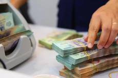 Đến ngày 15/12, thu ngân sách nhà nước năm 2022 đạt 1.691,8 nghìn tỷ đồng, vượt 19,8% so với dự toán. Ảnh: Nhã Chi