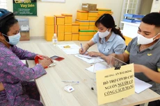 Người lao động tự do bị ảnh hưởng bởi Covid-19 sẽ được chi trả tiền hỗ trợ an sinh xã hội từ ngày 10/5. Ảnh: B.Vân