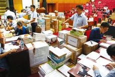 Các gói thầu mua sắm tập trung có số lượng hàng hóa rất lớn, phạm vi cung cấp rộng và tiến độ bàn giao nhanh khiến nhà thầu trúng thầu vất vả hơn. Ảnh: Hải An