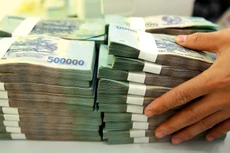 Cầu tín dụng giảm, tiềm ẩn tăng nợ xấu là những tác động của dịch Covid-19 tới tăng trưởng tín dụng. Ảnh: Lê Tiên