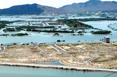 Trong điều kiện khó khăn về vốn, việc mở rộng phạm vi cấm thực hiện dự án phân lô bán nền có thể tạo thêm khó khăn cho doanh nghiệp bất động sản. Ảnh: Lê Tiên