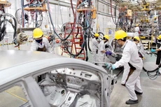 Việc Việt Nam kiểm soát tốt dịch Covid-19 đã gây ấn tượng mạnh với các nhà đầu tư, góp phần giúp cộng đồng doanh nghiệp yên tâm khi đầu tư sản xuất, kinh doanh. Ảnh: Tường Lâm