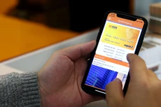 Dịch covid-19 có thể là cơ hội tốt để các tổ chức tín dụng đẩy mạnh quá trình chuyển đổi, phát triển ngân hàng số. Ảnh: Lê Tiên