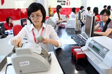 Trong 2 tháng đầu năm 2020, tăng trưởng tín dụng toàn hệ thống ngân hàng chỉ đạt 0,06%, giảm mạnh so với cùng kỳ năm 2019. Ảnh: Trần Việt