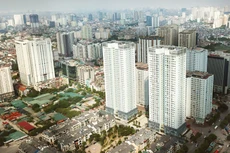 Đến cuối tháng 3/2020, tín dụng đối với lĩnh vực bất động sản tăng 1,23% so với cuối năm 2019, chiếm 19,31% tổng dư nợ tín dụng. Ảnh: Lê Tiên