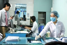 Nội dung chính của Gói thầu số 13 là toàn bộ hạng mục thi công và lắp đặt thiết bị theo công trình, mua sắm trang thiết bị văn phòng… Ảnh: Nhã Chi