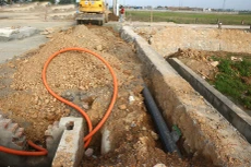 Gói thầu Thi công xây dựng công trình thuộc Dự án Hạ tầng kỹ thuật khu dân cư Đồng Bừng, xã Đông Anh, huyện Đông Sơn (Thanh Hóa) lựa chọn nhà thầu qua mạng. Ảnh minh họa: Nhã Chi